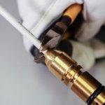 Trim AccuLock S Liner flush with back of power pin. How To Install AccuLock™ S Liners, step 4a